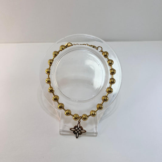 Pulsera - Acero Dorado Bolitas con Nudo de Bruja